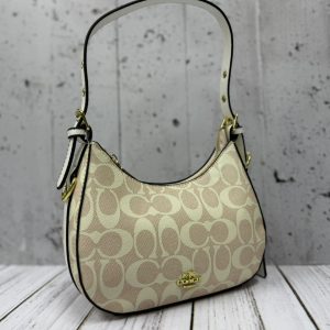 cartera media luna con strap